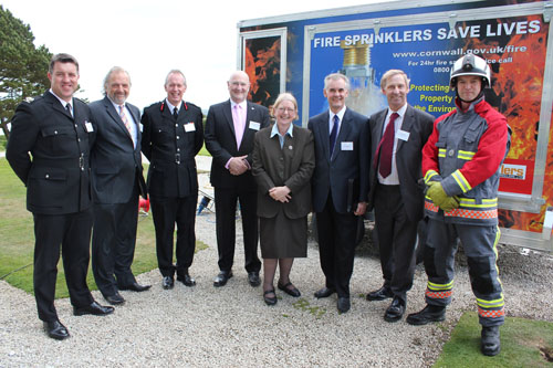 Photograph attached L – R CFRS Area Manager, Kevin Thomas; Steven Richford, Managing Director, Richfords Fire and Flood Limited; CFRS Chief Fire Officer, Des Tidbury; Lance Kennedy, Cornwall Council portfolio holder for public protection; Welsh Assembly member Ann Jones; John Hughes; Steve Mills, British Automatic Fire Sprinkler Association; CFRS Station Manager Justin Sharp.
